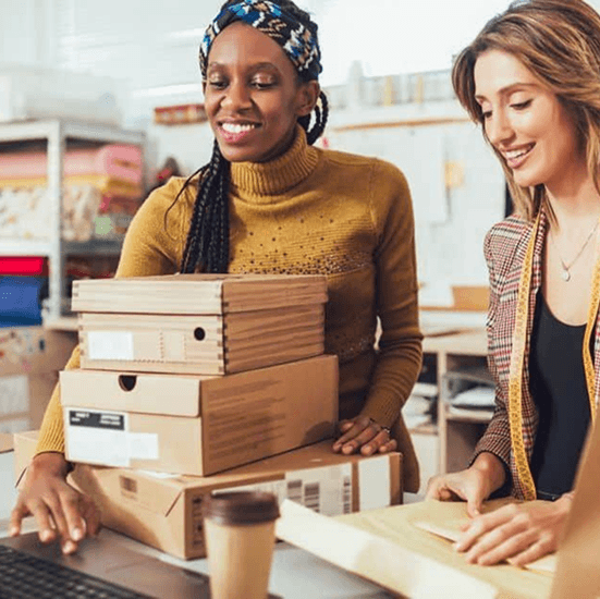 Two women working together